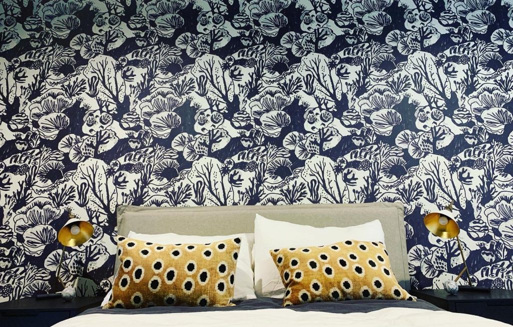 These walls coral wallpaper