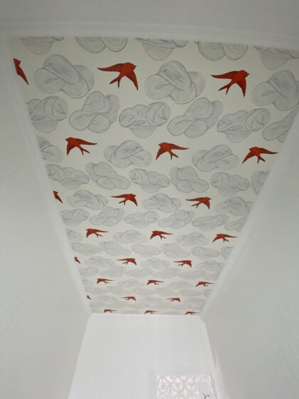 Bird wallpaper on ceiling