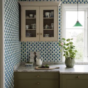 Fruity wallpaper of blue plums in a kitchen