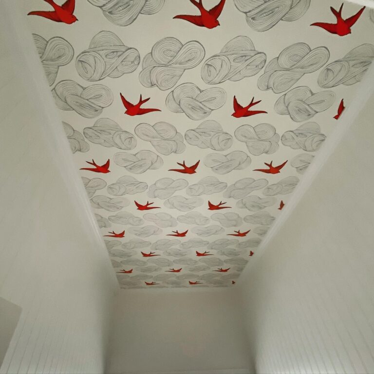 Ceiling in entry wallpapered