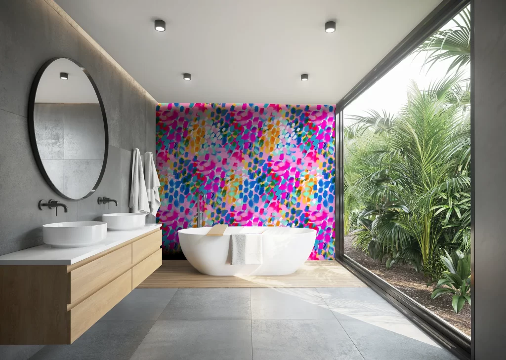 bathroom showing feature wallpaper in bright colours