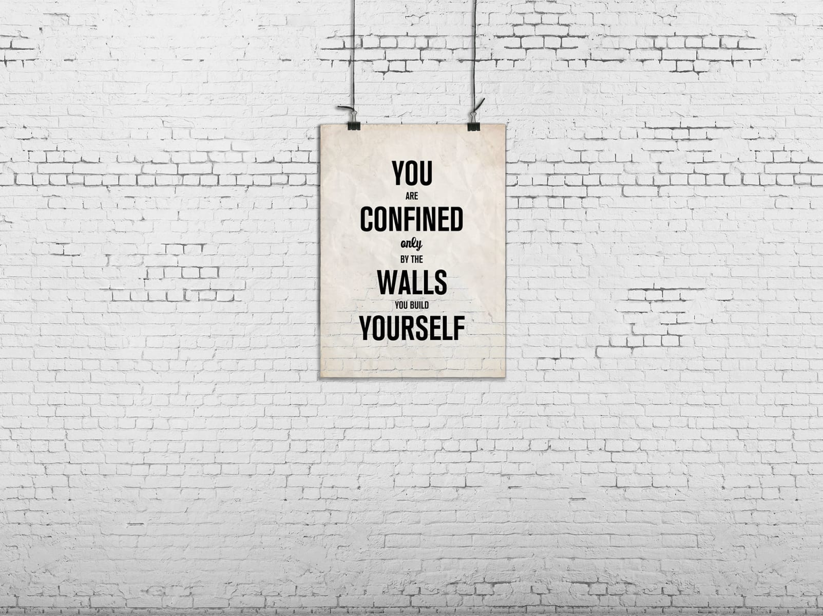 Rebelwalls mural of a white brick wall with a poster and motivational quote