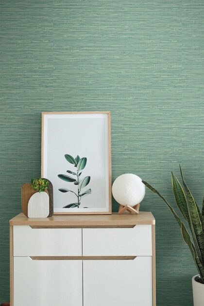 Green turquoise textured wallpaper. Vinyl imitating grassweave room shot