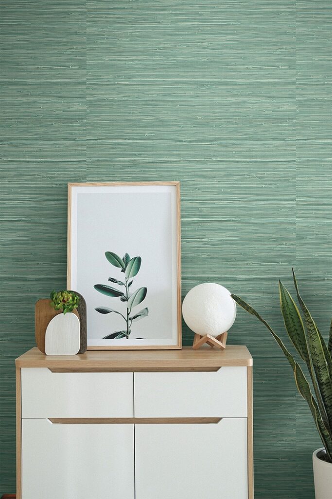 Green turquoise textured wallpaper. Vinyl imitating grassweave room shot