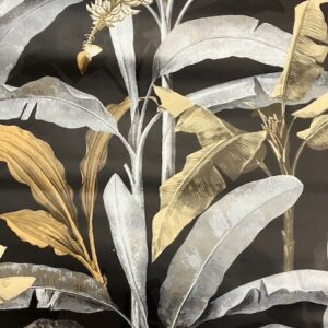 Black wallpaper with gold and silver palm leaves.