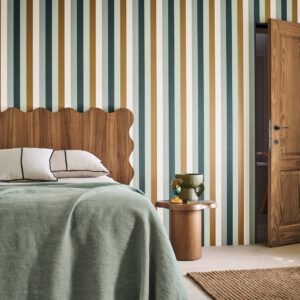 striped Casamance wallpaper in a bedroom