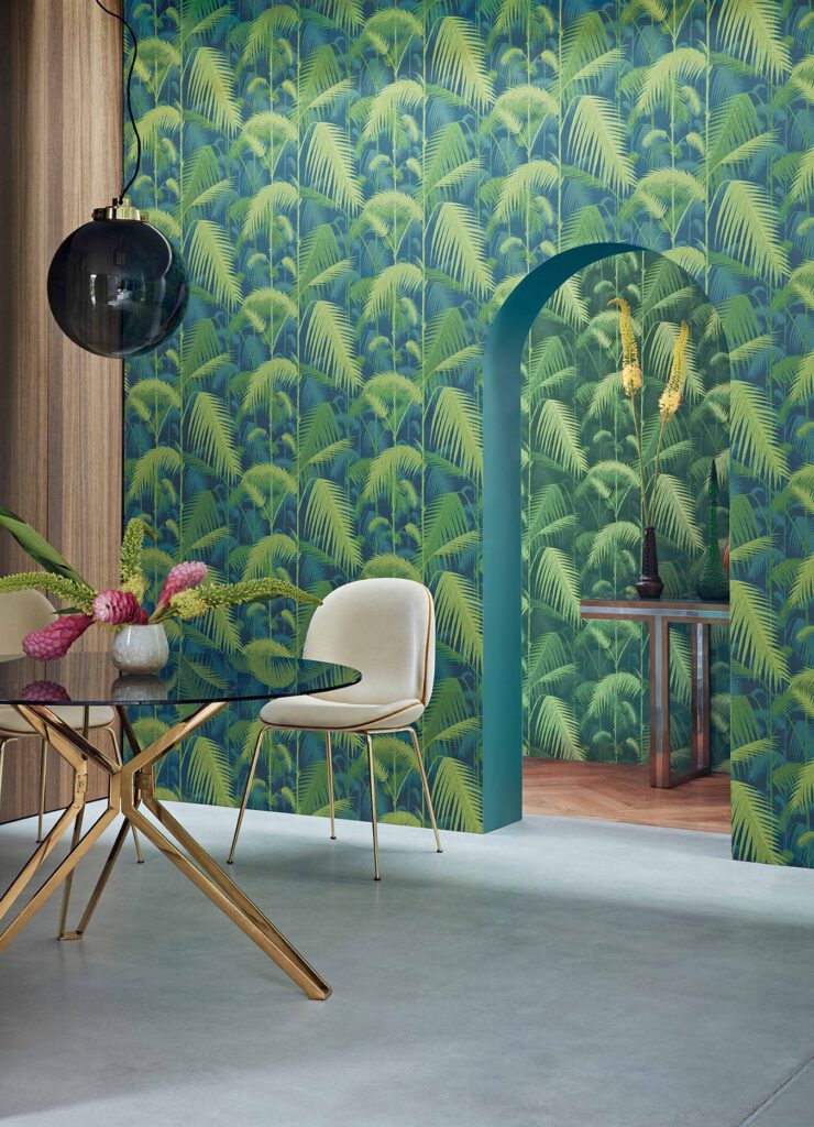 Dining room with curved entry and Palm Jungle wallpaper in two colours