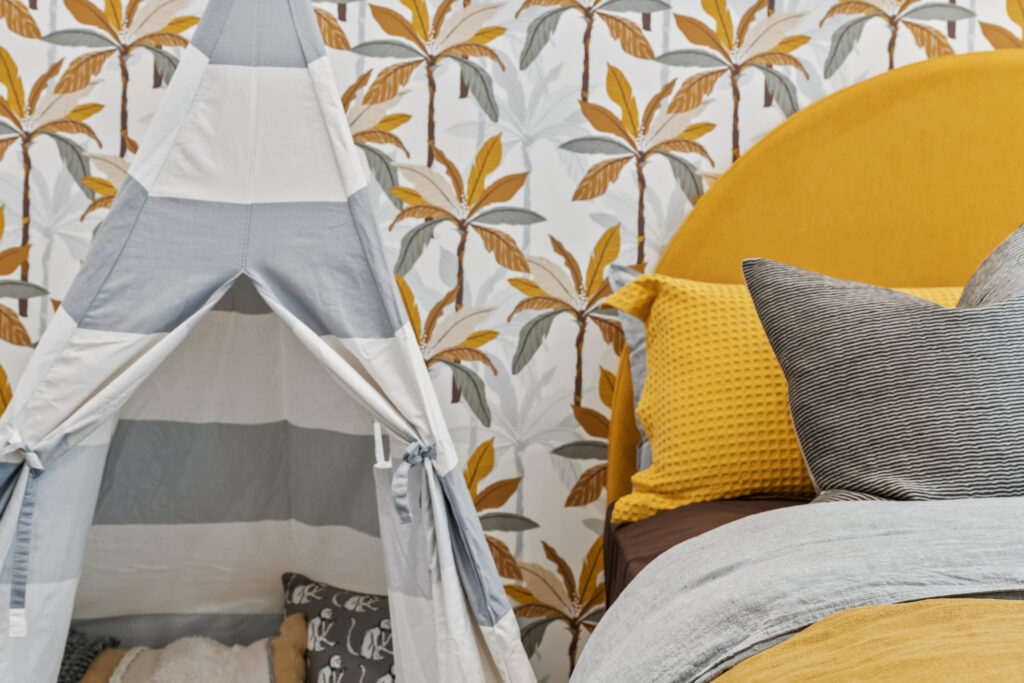 Yellow palm tree wallpaper in kids room in a Neptune Homes display home