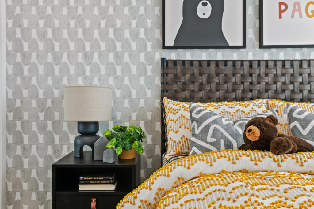 Neptune Homes display using These walls wallpaper on bedhead wall