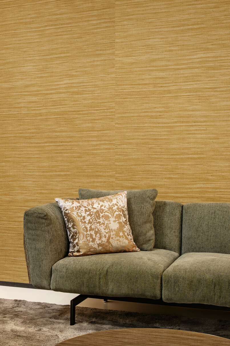 Lignes mustard yellow vinyl wallpaper with textured embossing in a living room