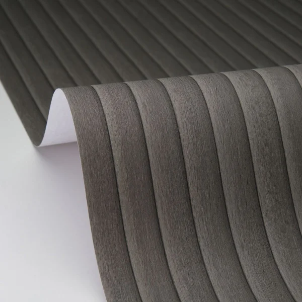 A roll of black timber lookalike wallpaper