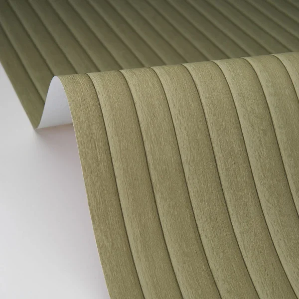 a roll of green timber effect wallpaper