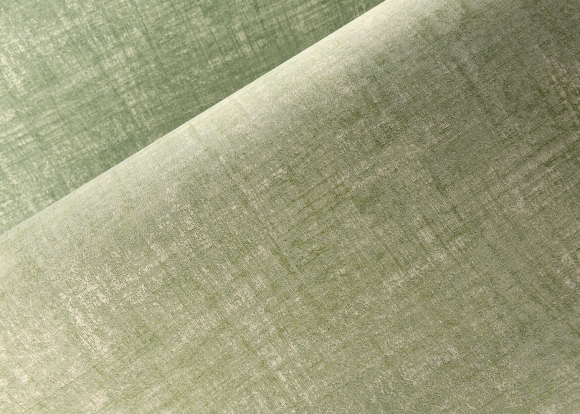 A roll of green wallpaper that looks like suede