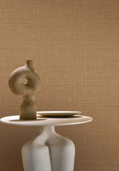 Lifestyle image of a textured tan wallpaper