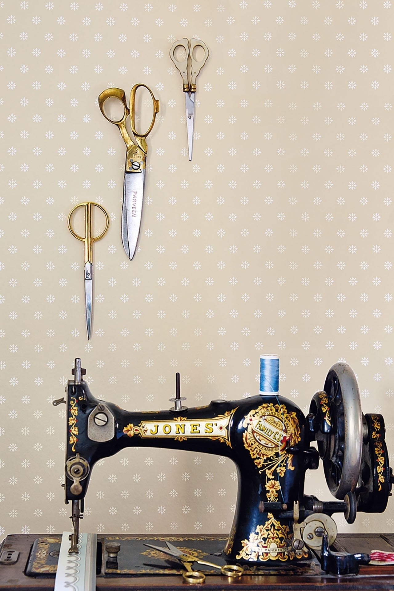 Victorian star wallpaper by Cole & Son in a sewing room