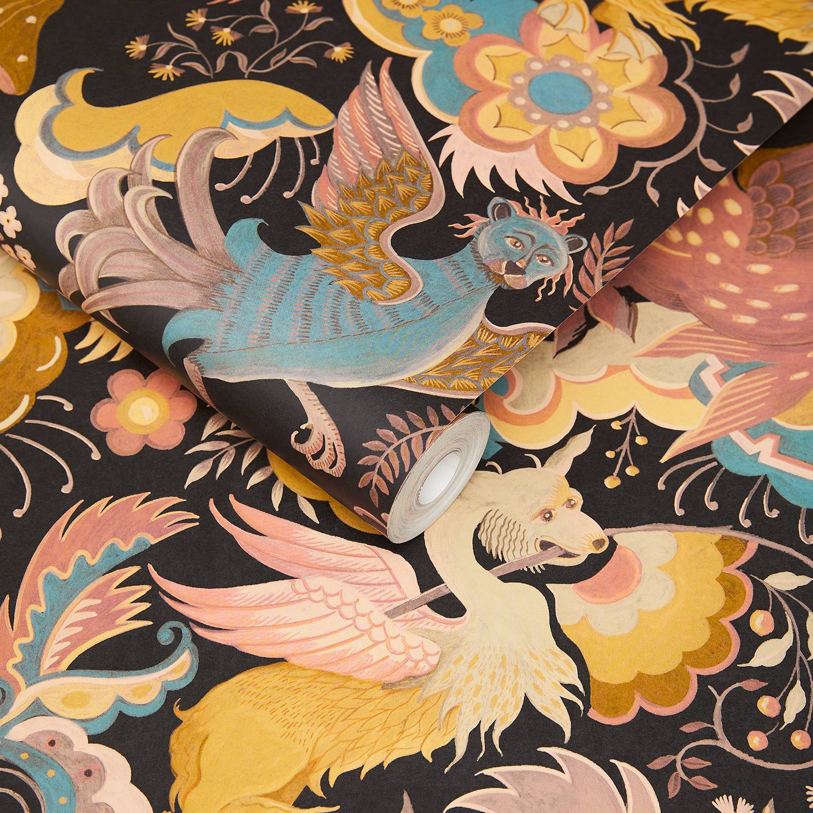 A roll of black wallpaper with mythical beasts in a whimsical garden