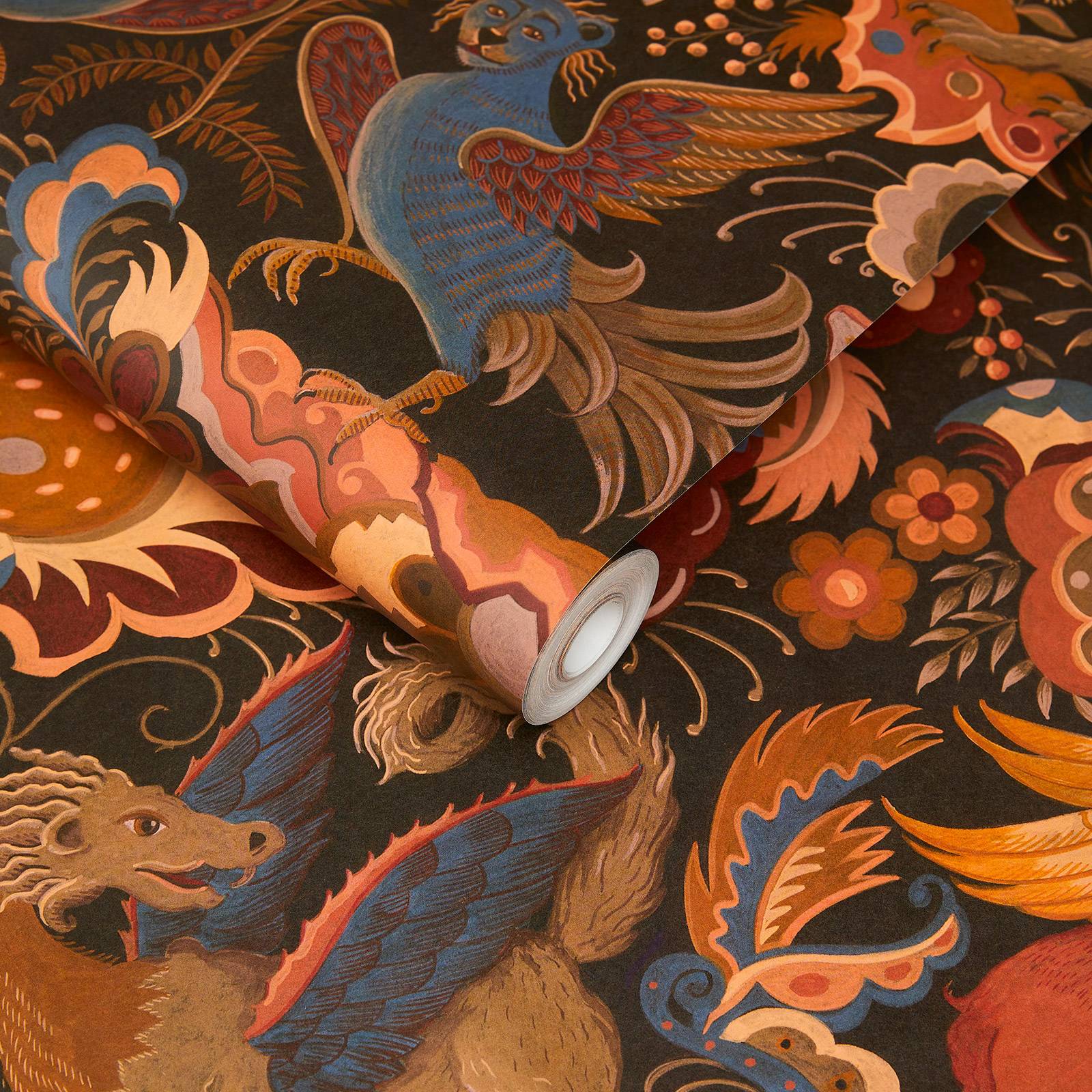 A roll of orange wallpaper featuring mythical beasts in a garden