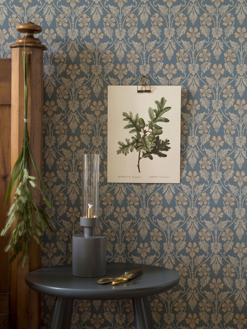 Nora in Blue a traditional wallpaper trellis design with pansies seen here in a traditional room