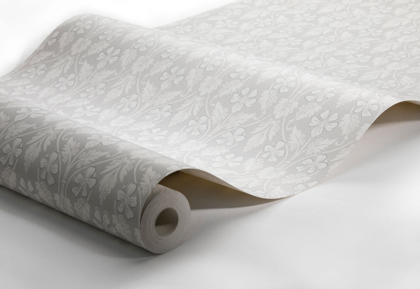 A roll of grey Art nouveau wallpaper