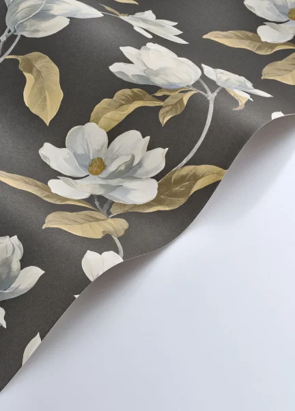 A roll of almost black Magnolia Mist wallpaper