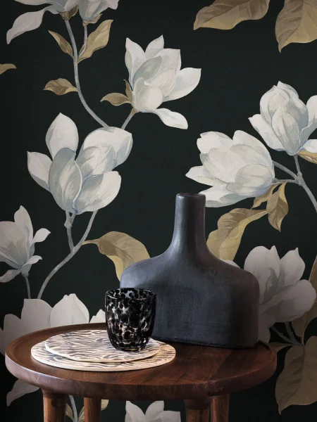Charcoal Black wallpaper with white magnolias seen with modern furniture