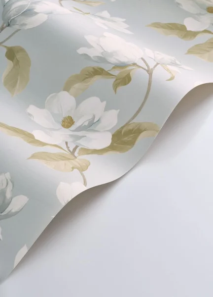 A roll of Magnolia Mist soft blue wallpaper