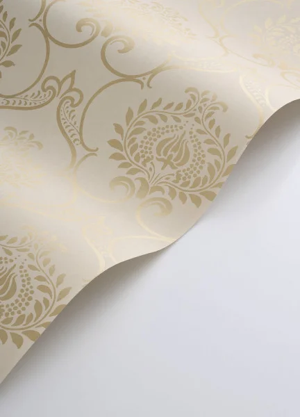A roll of cream damask wallpaper