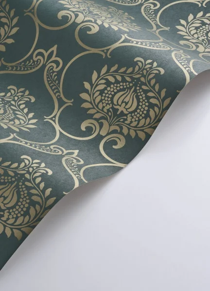 A roll of Empire Green wallpaper in a scrolling floral pattern