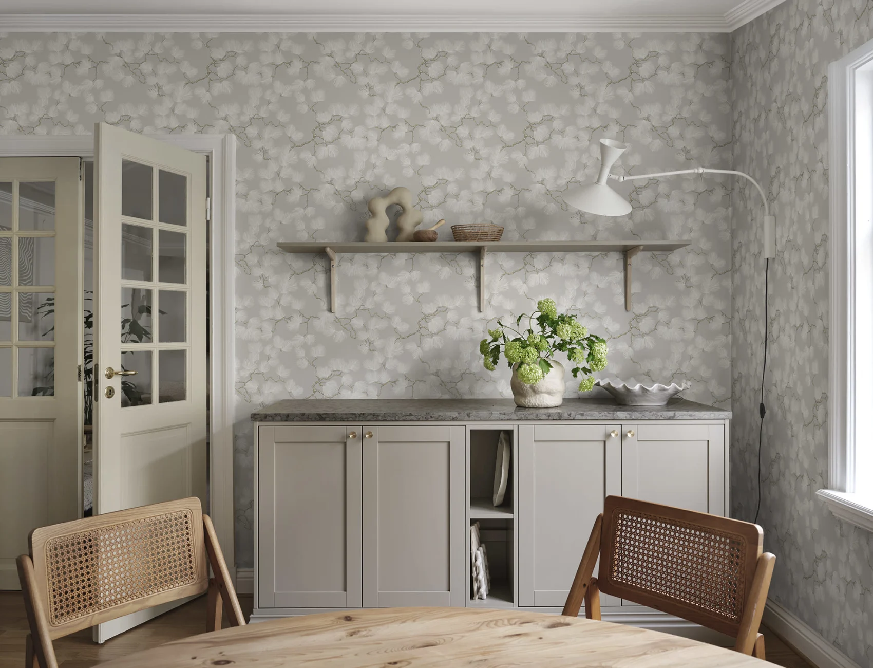A Scandi style kitchen with pine tree wallpaper in grey