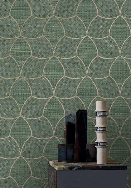 Lifestyle imagery with a rich celadon textured wallpaper by Casamance