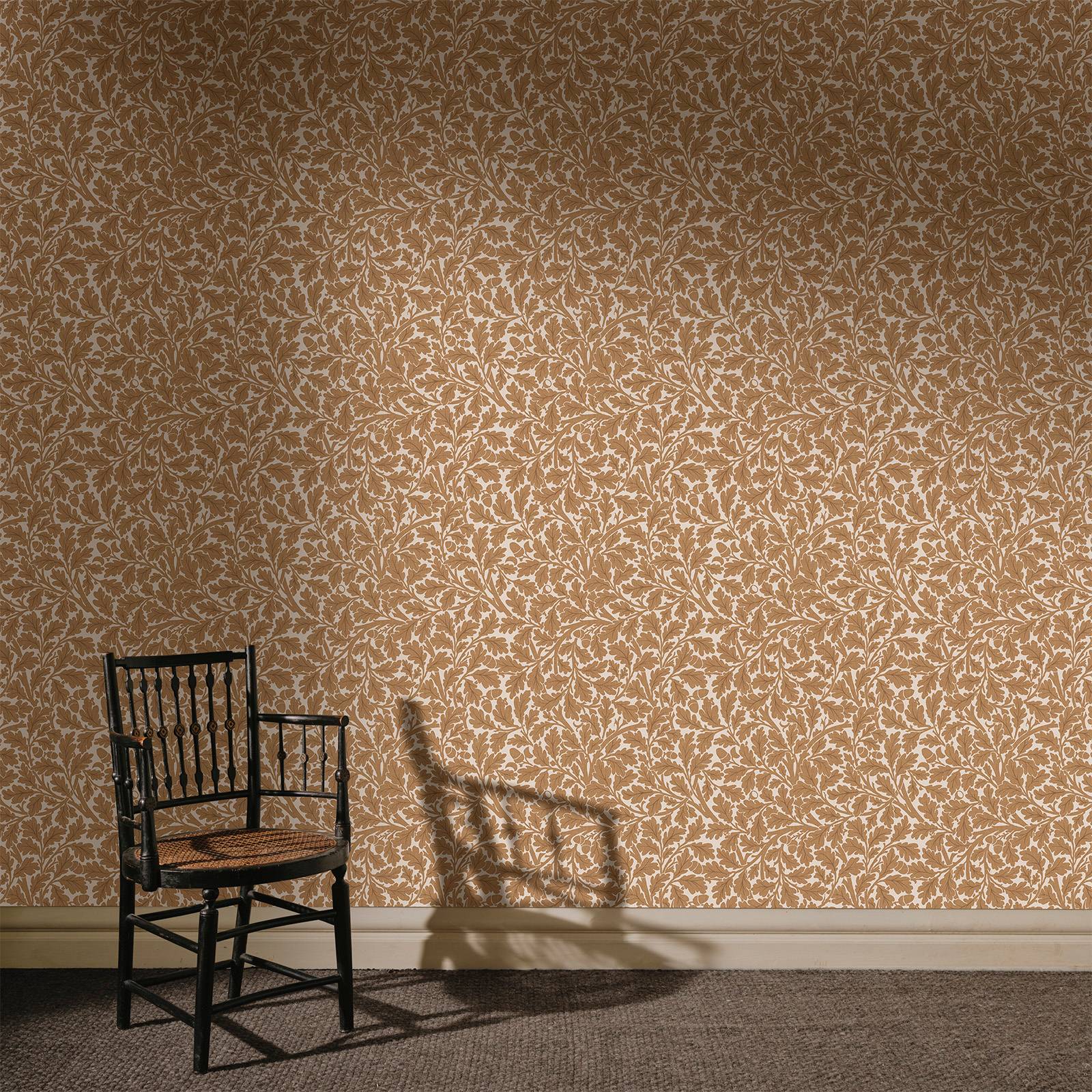 Quercus in amber orange wallpaper of the iconic William Morris Acorn print