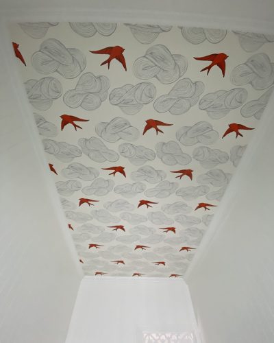 Bird and cloud wallpaper a great idea for the ceiling