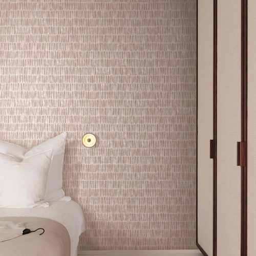 Shell Pink tactile lined wallpaper in a modern bedroom
