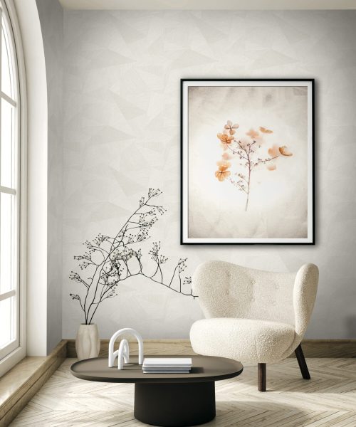 Graphic cream wallpaper of random shapes and lines in a soft airy room setting