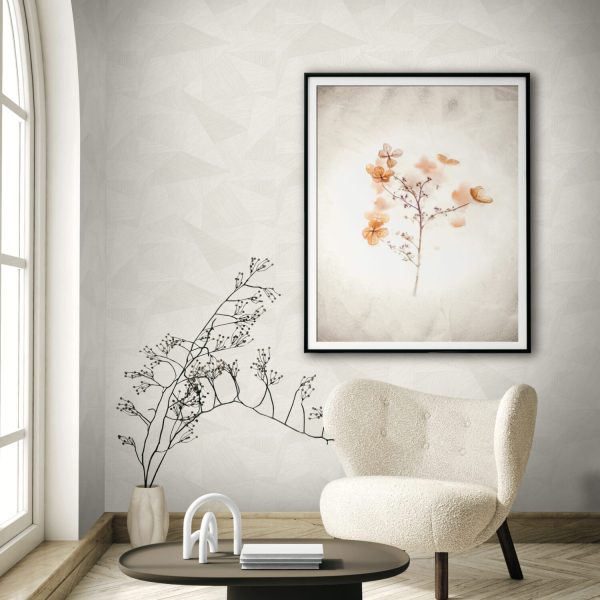 Graphic cream wallpaper of random shapes and lines in a soft airy room setting